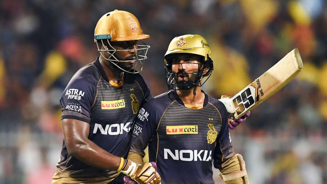 930818 928745 915952 818118 andre russell and dinesh karthik afp