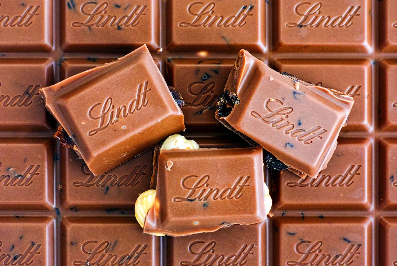 Lindt Swiss Classic Gold Milk chocolate with raisins hazelnuts and almonds